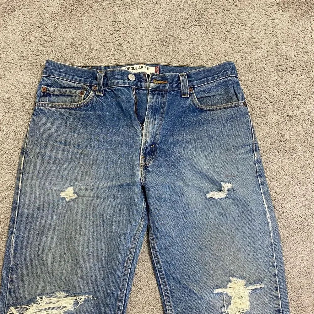 Levi's Mens 505 straight leg 33x34 Blue Distressed Jeans